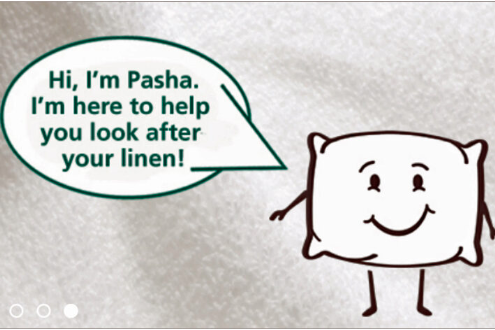 A pillow with a speech bubble that says i'm pasha help you look after your linen.